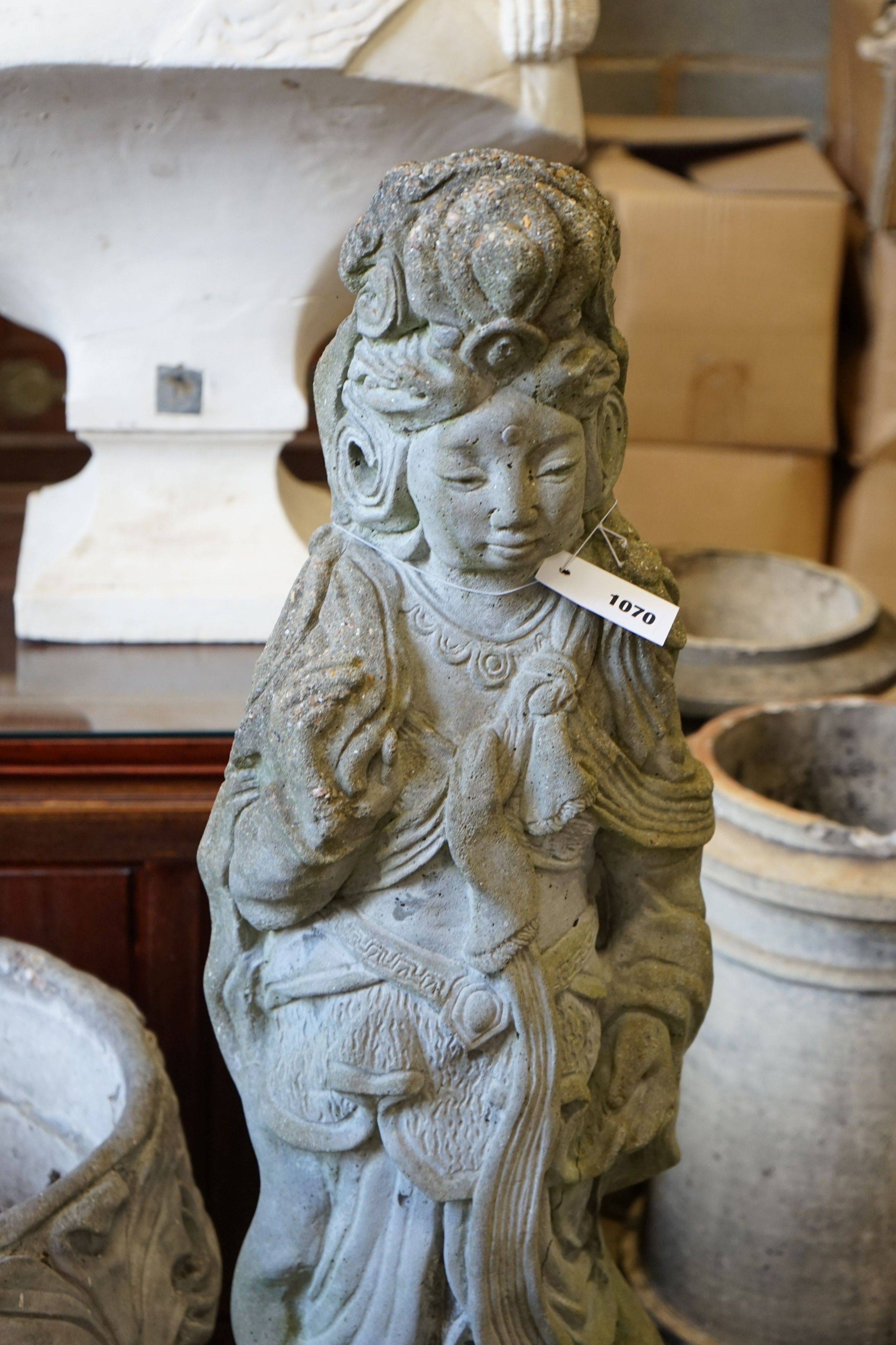 A Chinese style reconstituted stone figural garden ornament, diameter 50cm, height 104cm